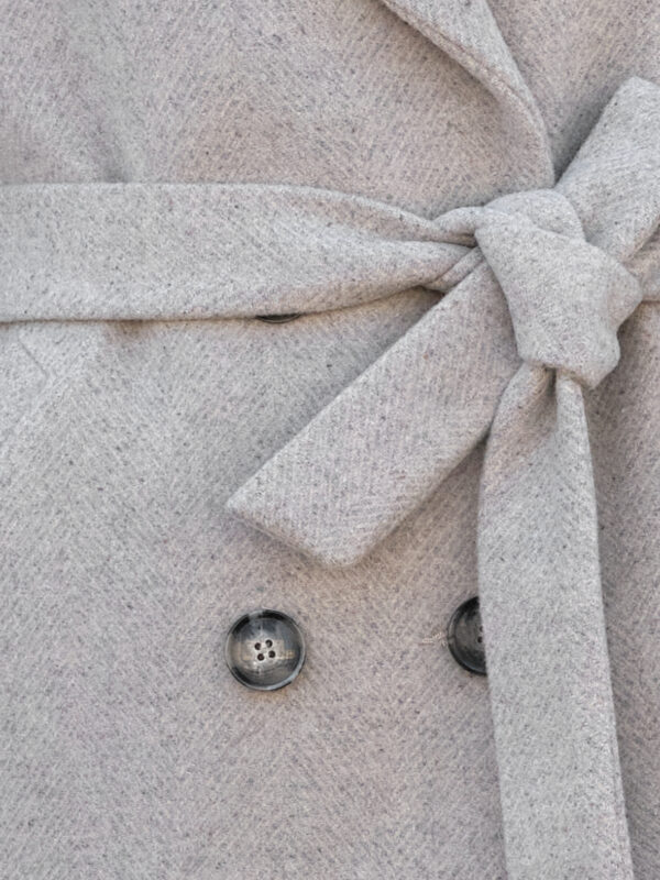 Jodełka szaro-beżowa delikatny nieokreślony i rozmyty wzór. Melanż szaro-beżowy.